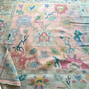 Hand-Knotted Pink Oushak Rug: Modern Turkish Wool Area Rug