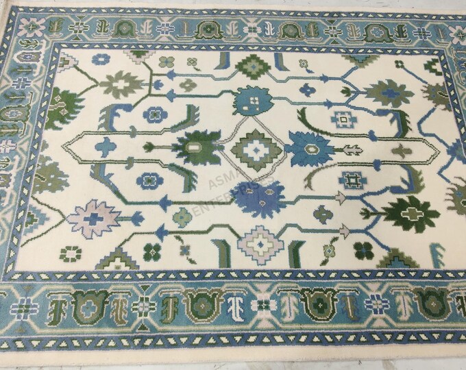Hand-Knotted Oushak Rug: 6x9 Turkish Wool Rug, Floral Design