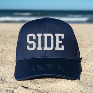 SIDE Embroidered Trucker Hat: LGBTQ Pride Snapback