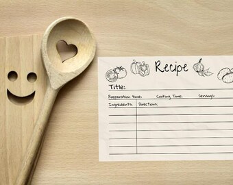May include: A blank recipe card with a title, preparation time, cooking time, servings, ingredients, and directions sections. The card is decorated with drawings of vegetables and spices.