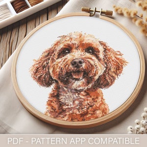 May include: Cross stitch pattern of a brown and white dog in a wooden embroidery hoop. The pattern is compatible with pattern apps.  PDF - PATTERN APP COMPATIBLE.