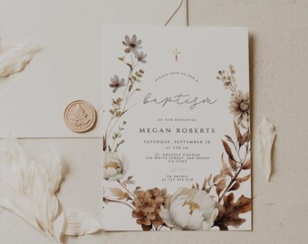 May include: A baptism invitation with floral design, featuring the text "baptism" and details for Megan Roberts' baptism. Includes an envelope, wax seal, and decorative feathers. The invitation is adorned with a cross and floral wreath.