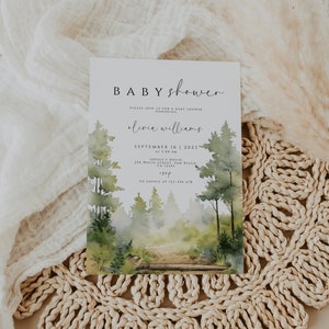May include: A watercolour illustration of a forest path with a baby shower invitation overlay. The invitation reads "BABY shower" and includes the text "Please join us for a baby shower honouring Olivia Williams, September 16, 2023, at 1:00 PM, Sophie's House, 216 White Street, San Diego, CA 12345, RSVP to Sophie at 123-456-678".
