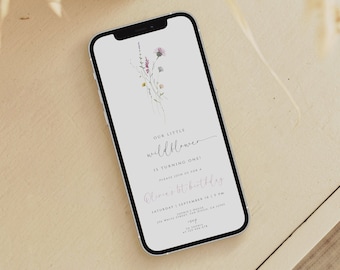 May include: A white smartphone with a floral design and the text "Our little wildflower is turning one!"  Please join us for a flower pot birthday. Saturday, September 1, 1:00 PM.  [Address] RSVP at [Phone Number]