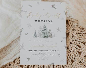 May include: A baby shower invitation with the text "Baby it's cold outside" in gold script. The invitation features snowflakes, pine trees, and the name "Annabelle Wilson". The event is scheduled for December 13th at 2 PM.