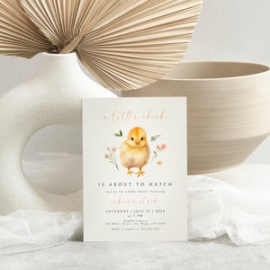 May include: A baby shower invitation with a cute illustration of a yellow chick with pink flowers. The text reads "a little chick is about to hatch, join us for a baby shower honoring [name] at 5 PM, Saturday, July 13, 2024, [address], RSVP to [phone number]"