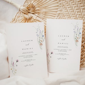 May include: Wedding invitation with a floral design. The invitation reads "Lauren and Daniel" and includes the date and time of the wedding. The invitation also includes the location of the wedding, "The White Inn, 278 White Street, San Diego, CA 92172".