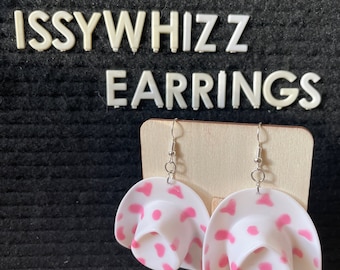 Mini pink cow print cowboy hat earrings
