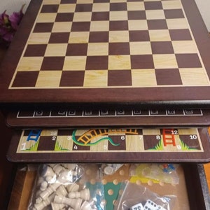 Wooden box with board games