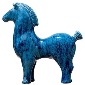 Ceramic sculpture of a horse, author&#39;s work , modern sculpture.
