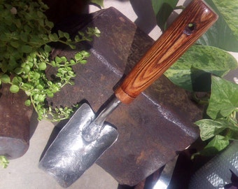 Made from recycled materials, Garden trowel with ash handle. Hand forged.