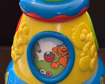 Sesame Street Musical Spinning Toy with Lights