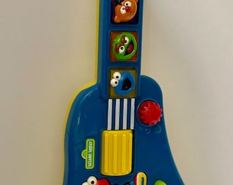 Tyco 1990 Sesame Street Let's Rock Elmo Guitar