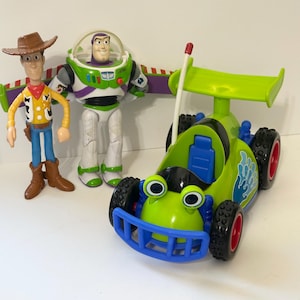Disney Pixar Toy Story RC Free Wheel Buggy with Buzz and Woody Figures