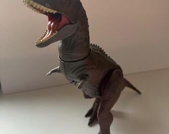 Jurassic World Carnotaurus "Toro" action figure from the Camp Cretaceous series