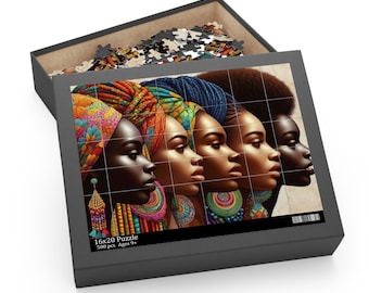 May include: A 500-piece jigsaw puzzle in a black box featuring an illustration of five profiles of individuals with diverse skin tones wearing colorful headwraps and ornate earrings. The box lid displays the text 16x20 Puzzle 500 pcs Ages 9+.