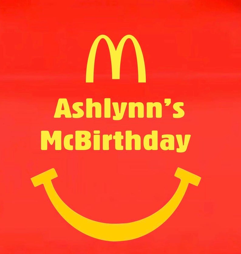 May include: Red background with the McDonald's golden arches logo and a yellow smiling face. The text "Ashlynn's McBirthday" is written in yellow, celebrating a birthday with a McDonald's theme.