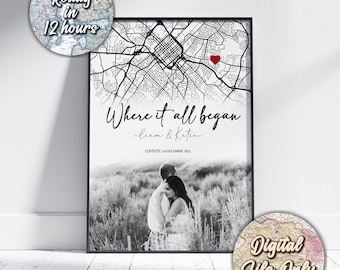May include: Black and white framed print featuring a map of London with a red heart marking a location. The text "Where it all began" is above a couple embracing. Includes the text "Liam & Katie" and "London 14 December 2022".