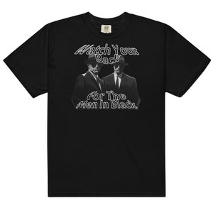 Cuida tu espalda para los hombres de negro Camiseta unisex de peso pesado teñida en prenda