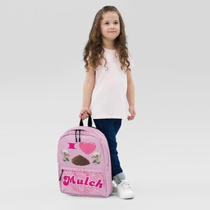 Paillis rose coquette mulchmaxxing paillis chiens soeur du limon sac à dos rentrée scolaire