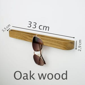 Self adhesive wooden glasses organizer, minimalist wall mounted holder for reading glasses, crafted from solid walnut or oak wood, perfect for modern bathroom or home office