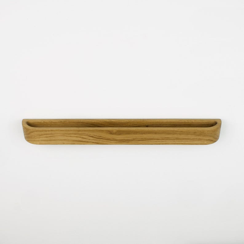 Minimalist wooden eyewear holder crafted from American walnut, self adhesive wall hook for reading glasses, functional and stylish organizer for contemporary interiors