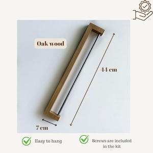 oak towel rack, wooden towel holder, wall mounted rack, minimalist wood hanger, Scandinavian design, modern bathroom decor, solid oak wood, handmade towel rack, eco-friendly bathroom, natural wood accessory, nordic home style, sleek wood rail, bathroom wall hook, functional wood decor, rustic modern rack, minimal bathroom storage, minimalist bathroom organizer, simple wood towel rail, wooden bathroom accessory, space-saving towel rack, zen bathroom decor, modern oak bathroom, clean design,
