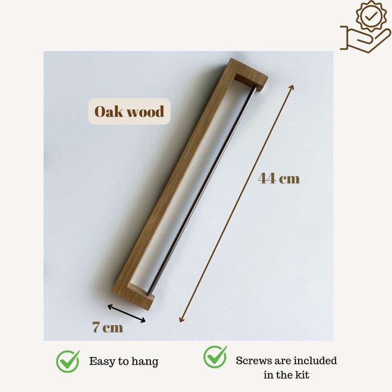 oak towel rack, wooden towel holder, wall mounted rack, minimalist wood hanger, Scandinavian design, modern bathroom decor, solid oak wood, handmade towel rack, eco-friendly bathroom, natural wood accessory, nordic home style, sleek wood rail, bathroom wall hook, functional wood decor, rustic modern rack, minimal bathroom storage, minimalist bathroom organizer, simple wood towel rail, wooden bathroom accessory, space-saving towel rack, zen bathroom decor, modern oak bathroom, clean design,