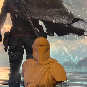 May include: A 3D-printed bust of a Mandalorian character, featuring a helmet and armor. The bust is light beige, with details of the armor visible. A larger image of the character is in the background, with a snowy landscape.