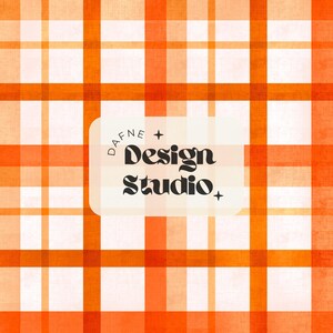 May include: Orange and white plaid pattern with the text "DAFNE + Design Studio" in a cream-colored rectangle. The plaid design features thick orange lines intersecting with thinner white lines, creating a grid.