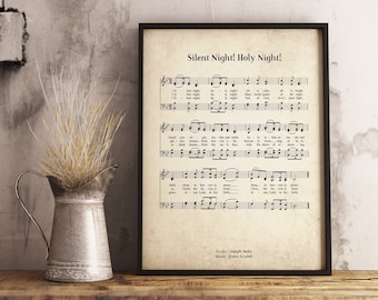 May include: A vintage-style printable art print featuring the sheet music for the Christmas carol "Silent Night! Holy Night!" The lyrics are by Joseph Mohr and the music is by Franz Gruber. The print has a cream background with black text and musical notes.
