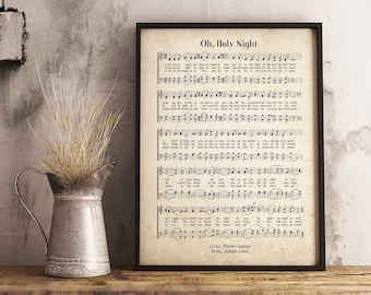 May include: A vintage-style printable sheet music for the Christmas carol "Oh, Holy Night". The sheet music is printed on a cream-colored paper with black ink and features the lyrics and musical notation.