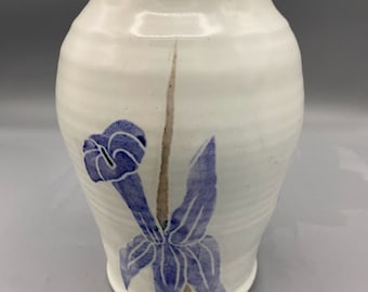 Blue carved flower vase is a hand thrown original pottery design and it is 7.5x5 inches tall and wide created by Svoboda Pottery. Cone 10.