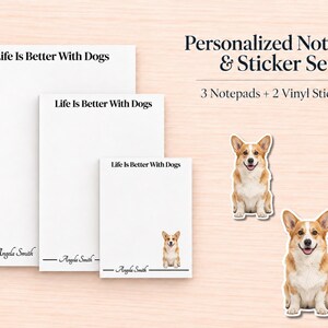 May include: A set of three white notepads in varying sizes and two vinyl stickers. Each notepad features the text Life Is Better With Dogs, a line, and the name Angela Smith. The smallest notepad and both stickers feature a Corgi dog.
