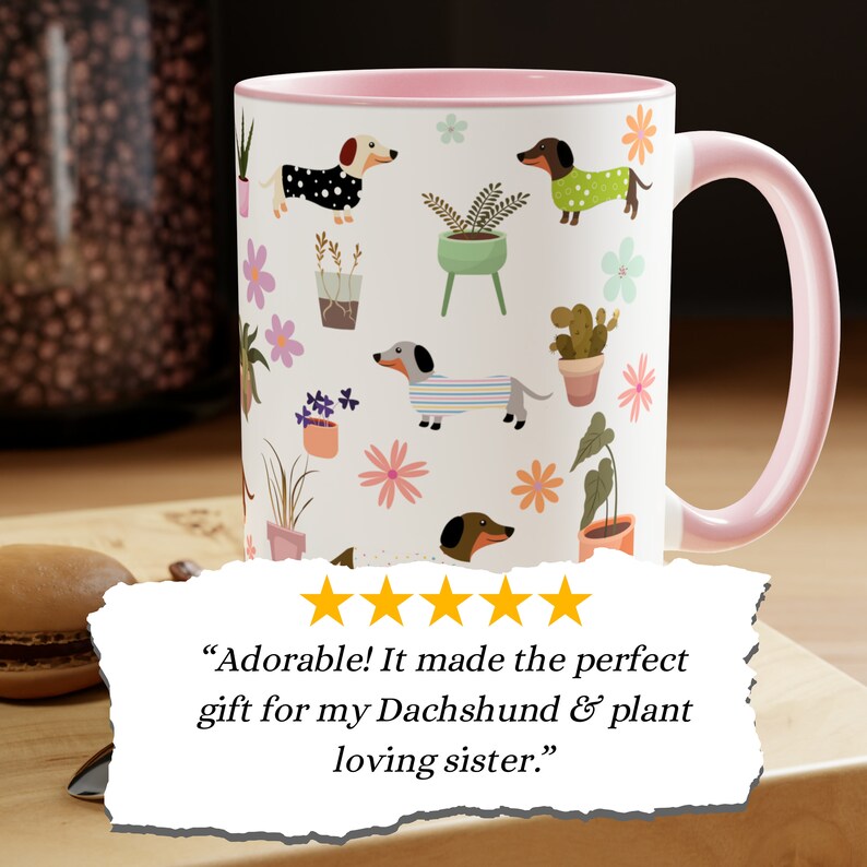 playful dachshunds in colorful bright sweaters with a large variety of plants15 oz ceramic mug with pink black or blue handles and matching interior