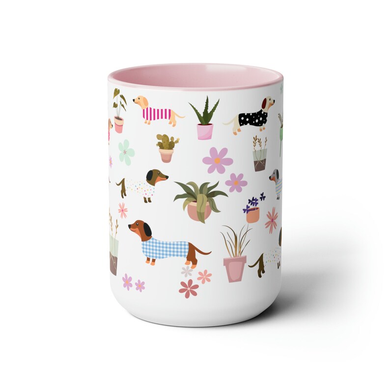 15 oz ceramic mug with colorful dachshunds and plants pink interior and matching handle