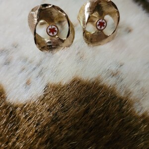 Pair of Air Canada Logo Cufflinks.