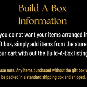 May include: Black background with gold text that reads "Build-A-Box Information." The text explains how to purchase items without a gift box. Additional text clarifies that items without a gift box will ship in a standard box.