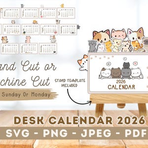May include: A 2026 desk calendar with a cat theme. The image shows a small wooden easel holding a calendar with cartoon cats, and individual monthly calendars with cat illustrations. Text includes "Hand Cut or machine Cut" and "Start Sunday Or Monday."