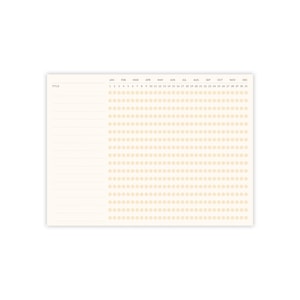 May include: A cream-coloured planner with a grid layout for tracking daily activities. The top row lists months, and the days of the month are numbered across the top. Rows are provided for titles and tracking dots.