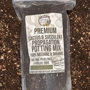 May include: A bag of premium cactus and succulent propagation potting mix. The bag is labeled with the text "Rooting for you Plant Nursery" and "100% Natural & Organic Soil Free, Peat Free & Perlite Free". The bag is handcrafted in small batches.