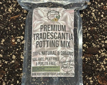 May include: A clear plastic bag filled with a dark brown potting mix for Tradescantia plants. The bag has a white label with the text "Rooting for you Plant Nursery" and "Premium Tradescantia Potting Mix". The label also states that the mix is 100% natural and organic, soil free, peat free, and perlite free. The ingredients are listed as pumice, coco coir, bark nuggets, and worm castings. The label also includes the website address "www.rootingforyouplantnursery.com".