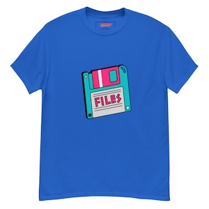 May include: A royal blue t-shirt with a retro-style floppy disk graphic. The disk is turquoise with a pink label and the word "FILES" in pink letters.