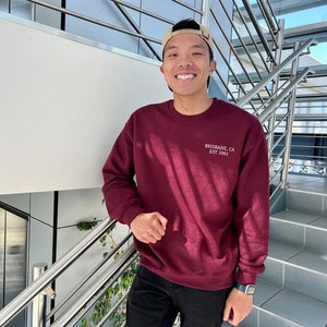 Brisbane Minimalistic Unisex Heavy Blend™ Crewneck Sweatshirt