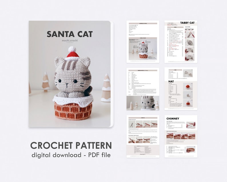 tabby crochet amigurumi santa cat sitting in the chimney. Cat in red santa hat entering the chimney. 100% cotton yarn beige brown tabby cat Christmas crochet softie on the white christmas trees background. Digital pdf download