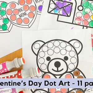 May include: A set of 11 printable Valentine's Day dot art pages featuring a teddy bear, hearts, and a mailbox. The pages are designed for children to use dot markers to color in the images.