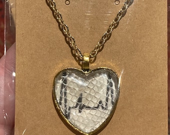 Heart Shaped Heartbeat Snake Shed Pendant on 24” Gold Base Metal Chain Necklace