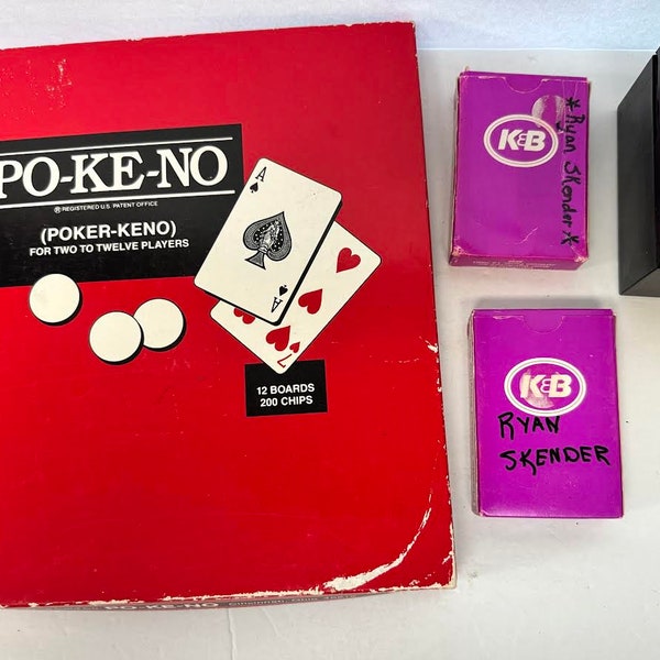 Vintage US playing card co. po-ke-no Poker-Keno 12 board Set, boards, chips, 2 sets of plastic-coated playing cards in hard plastic holder.