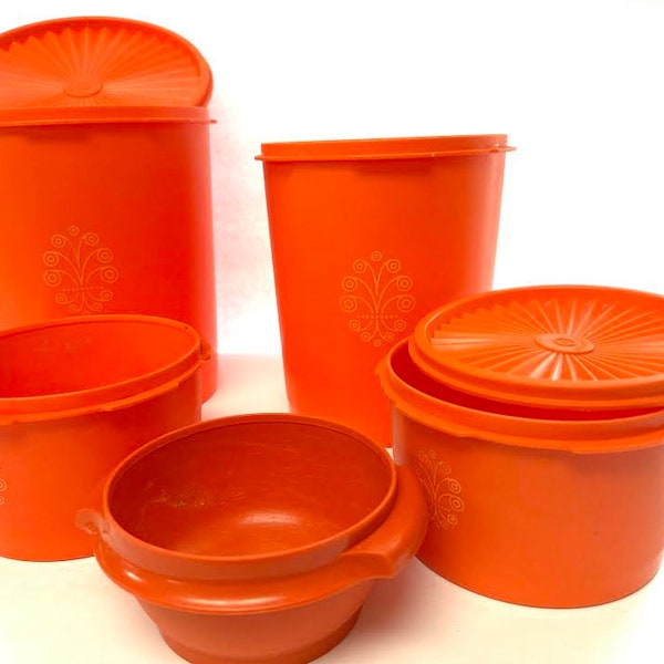 Vintage orange with yellow design Tupperware 5 canister containers 2 lids.