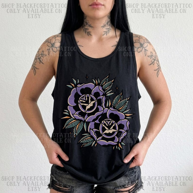 May include: Black tank top featuring a purple rose tattoo design with green leaves and yellow accents. The text "SHOP BLACKFORDTATTOO ONLY AVAILABLE ON ETSY" is printed around the top.